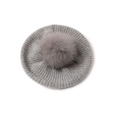 a gray hat with a fur ball on top