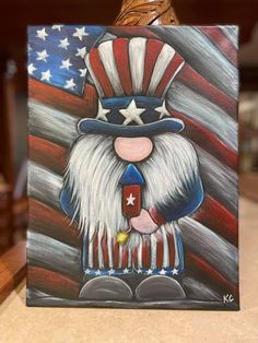 a painting of an uncle lincoln with the american flag on it's face and hat