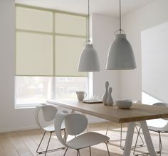 an image of a dining room setting with white chairs and wooden table in the foreground