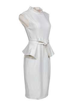 Sophisticated ivory dress in a figure flattering peplum silhouette. Take this dress to the next level by accessorizing it with a pair of dazzling statement earrings! Size 6 Shell: 63% Polyester, 33% Viscose, 4% Elastane Lining: 100% Polyester Stand collar neckline Concealed back seam zipper closure Sheath silhouette Sleeveless Peplum detail Bust 31" Waist 28" Shoulder to hem 43" Elegant Peplum Midi Dress For Party, Chic Off-white Midi Dress For Wedding, Chic Peplum Midi Dress For Cocktail, Chic Peplum Midi Dress For Work, Elegant Formal Peplum Midi Dress, Chic Evening Midi Dress With Peplum, Chic Peplum Midi Dress For Evening, Chic Evening Peplum Midi Dress, Elegant Off White Evening Dress