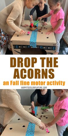 three children are playing with an acorns activity on a cardboard box and the text drop the acorns is above it