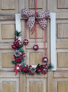 a door decorated with ornaments and bows