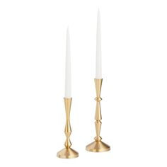 two gold candlesticks with white candles