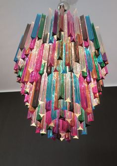 a multicolored chandelier hanging from the ceiling