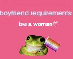 a frog holding a rainbow flag with the caption, be a woman