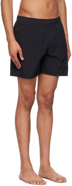 Crinkled ECONYL® regenerated nylon taffeta swim shorts. · Concealed drawstring at elasticized waistband · Three-pocket styling · Logo patch at front · Briefs-style nylon mesh lining Supplier color: Black Supplier code: 8115B0943 Black Nylon Swim Trunks With Drawstring, Nylon Swim Trunks With Drawstring And Relaxed Fit, Relaxed Fit Nylon Swim Trunks With Drawstring, Nylon Beachwear Bottoms With Side Pockets, Beachwear Nylon Bottoms With Side Pockets, Nylon Bottoms With Functional Drawstring For Poolside, Beachwear Nylon Bottoms With Functional Drawstring, Relaxed Fit Nylon Swim Trunks With Functional Drawstring, Relaxed Fit Nylon Swimming Bottoms