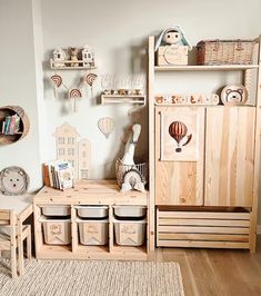 a child's room with wooden furniture and toys