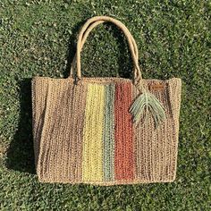 Handmade Posts from a small business in Turkey Materials: natural raffia yarn Definition Every woman should have this bag for every fashionista. Whether you keep it for yourself or gift it to someone you care about, it will be unforgettable. ✔️I made this beautiful bag from organic cotton milky brown(colorful) natural paper rope. ✔️The inside of the product is lined and 2 compartments are sewn. ✔️There is a magnetic button on the inside of the wicker summer bag. Suitable for use as a shoulder ba Casual Handwoven Beige Bag, Casual Beige Handwoven Bag, Green Rectangular Jute Shoulder Bag, Natural Crochet Bag For Travel, Fair Trade Natural Crochet Bag For Travel, Multicolor Rectangular Jute Shoulder Bag, Multicolor Rectangular Jute Crochet Bag, Multicolor Rectangular Crochet Jute Bag, Artisan Woven Bags For Everyday Use