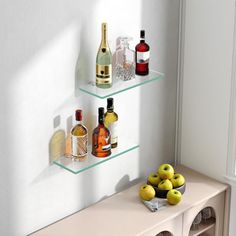 a shelf with bottles and glasses on it next to a wall mounted wine bottle rack