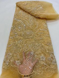 This high quality Fabric is measured in 5 Yards With Embroidered Beading and Sequin. It is soft, very delicate and beautiful. This high Quality Fabric is made with Fashion embroidered rhinestones can be used in making party wedding dresses, skirts, shawls, scarves and other other fashion apparels as you would like. Size : Length : 5 yards (180 inch). Width: 50 inch (Please allow slight deviation for the measurement data ,±1 inch) Material: 100% Polyester, Tulle Lace Fabric, Eco-Friendly embroide Wedding Dress Material, Beading Netting, Beaded Lace Fabric, Nigerian Lace, Beaded Tulle, Bridal Fabric, African Lace, Wedding Fabric, Beads Online