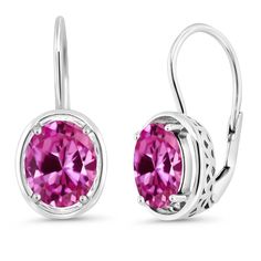 PRICES MAY VARY. Radiant Elegance: Elevate your style with our exquisite 925 Sterling Silver Pink Created Sapphire Dangle Earrings. The captivating Oval 9X7MM Pink Created Sapphire gemstones, totaling 4.80 Cttw, exude radiant elegance and add a touch of glamour to any look. Quality Sterling Silver Setting: Crafted with precision, these earrings feature a premium 925 Sterling Silver setting that enhances the brilliance of the Pink Created Sapphire gemstones. The use of high-quality materials ensu Pink Topaz Earrings, Pink Topaz, Mystic Topaz, Sterling Silver Dangle Earrings, Anniversary Gift For Her, Pink Earrings, Gem Stone, Fine Jewellery Earrings, Topaz Gemstone