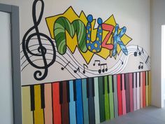 a colorful wall with musical notes painted on it