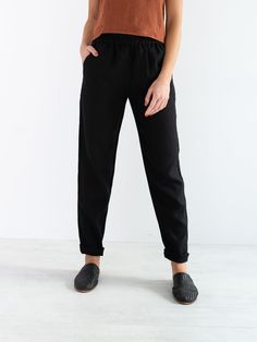 "BRINLEY is a simple high waist linen pants. DETAILS - High waist - Elastic waist - Tapered / slim leg - 100% lightweight European linen fabric - Cut and sewn to order just for you in our studio COLOR - Black, you can also choose other colors above - Fabric samples are available here https://www.etsy.com/listing/586569696/linen-fabric-samples SIZING & FIT - Relaxed fit - Waist (laid flat) is approximately 13 inches / 33 cm - Inseam is approximately 30 inches / 76 cm - Full length (waist to l Linen Bottoms With Elastic Waistband For Fall, High Waist Pull-on Pants For Everyday, Fall Linen Bottoms With Elastic Waistband, High Waist Solid Sweatpants For Workwear, Everyday High Waist Pull-on Pants, Chic Non-stretch Everyday Pants, Everyday High Waist Pants With Elastic Waistband, Solid Linen Pants For Workwear, Chic Linen Pull-on Pants