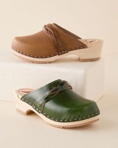 Aptly named, these '80s-inspired leather clogs will be your new BFFs for the season. Handcrafted in Maine using FSC-certified European limewood, with a shorter heel height designed for keep-going-and-going comfort. By Kurier Slip-on style Round toe Braided leather detail across the vamp Leather upper; unlined FSC-certified limewood base 1 1/2 heel; 1/2 platform Man-made sole and heel cap Due to the inherent qualities of genuine leather, subtle color variations will occu Casual Green Leather Clogs, Green Leather Sole Mules For Spring, Green Mules With Leather Sole For Spring, Spring Green Mules With Leather Sole, Green Leather Footbed Clogs With Round Toe, Green Leather Slip-on Clogs, Green Spring Clogs With Removable Insole, Green Clogs With Rubber Sole And Round Toe, Green Casual Mules With Wooden Heel