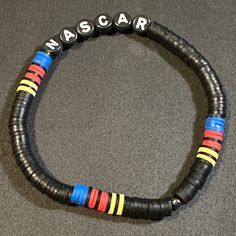 NASCAR friendship bracelet in both modern and vintage colors Retro Multicolor Bracelets As Gift, Retro Multicolor Bracelets For Gift, Multicolor Retro Bracelet For Gift, Multicolor Retro Bracelet As Gift, Multicolor Retro Bracelets For Gift, Personalized Multicolor Wristband, Retro Multicolor Bangle Bracelets, Vintage Adjustable Bracelets With Colorful Beads, Retro Adjustable Jewelry With Colorful Beads