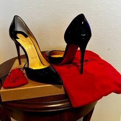 A Beautiful Pair Of Louboutin Stillettos. Black Patentent Leather, Size 37 Which Is Equivilant To Size 5 1/2 Us. The Shoes Have Never Been Worn And Have Never Touched Any Hard Floor. The Red Soles Are Intact And Perfect. Luxury Court Shoes With 4-inch Heel For Gala, Luxury Evening Court Shoes With 4-inch Heel, Luxury High Heel Formal Shoes, Luxury Red-sole Heels For Cocktail, Luxury Red Sole Heels For Cocktail, High-end High Heel Formal Heels, Luxury Heels With Red Sole For Cocktail, Luxury Evening Court Shoes With Reinforced Heel, Luxury Evening Court Shoes With Wrapped Heel