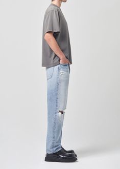 Cue the nostalgia. This 90’s inspired mid-rise is designed to sit relaxed on the waist with an eased up, straight fit through the body. This fit is true to size. Looks Like: Destructed light indigoFeels Like: Midweight, non-stretch regenerative cotton 90s Style Rigid Denim Straight Leg Jeans, 90s Relaxed Fit Jeans In Rigid Denim, Full-length Rigid Denim Washed Jeans, Agolde 90s Mid Rise Loose Fit, Straight Fit Full-length Rigid Denim Jeans, 90s Jeans, Mid Rise