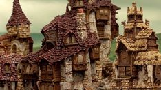 a group of buildings made out of clay