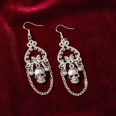 This Unique Pair Is A Wonderful Addition To Your Wardrobe And Your Style; Sure To Get Lots Of Compliments! Great For Halloween Or Anytime! Gsun4e50m00n845 Gsunq550200mb7c Punk Skull Earrings For Party, Edgy Skull Earrings For Parties, Gothic Skull Earrings For Party, Gothic Skull Print Earrings For Gift, Skull Shaped Metal Earrings, Adjustable Gothic Skull Earrings, Edgy Skull-shaped Earrings For Gift, Skull Fire, Boho Drop Earrings