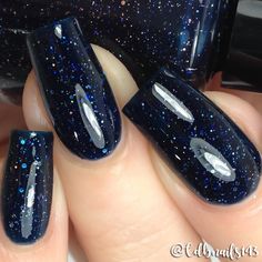 Loaded with small silver holographic glitters, this dark denim, navy jelly polish offers full coverage in 2-3 coats. Type: Jelly Base: 5-Free Glitter Load: Medium Glitter Size: Micro - Small Recommended Coats: 3 coats for full coverage depending on application style. Notes: In the bottle picture, the polish looks near black. This is a navy polish, but it is dark to allow for a deeply colored, full coverage look. For best results shake bottle gently before use and follow with a quick-dry top coat Navy Blue Shimmer Nails, Navy Jelly Nails, Dark Blue Glittery Nails, Navy Formal Nails, Sparkly Navy Nails, Navy Blue Nails Stars, Blue Sparkle Nail Designs, Navy Blue Dip Powder Nails, Silver And Navy Blue Nails