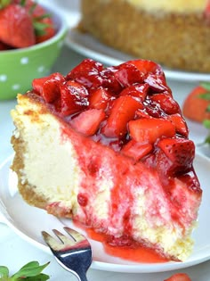 a slice of cheesecake with strawberries on top