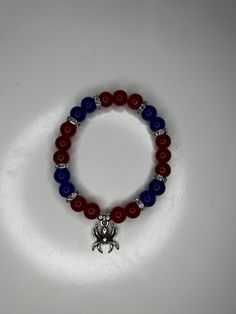 red and blue spider man beaded bracelet 8mm beads Spider Man Bracelet Beads, Casual Red Wristband With Round Beads, Red Stretch Bracelet With 8mm Beads, Casual Red Bracelets With Spacer Beads, Casual Red Jewelry With 8mm Beads, Beaded Bracelets For Boys, Boy Bracelets, Bracelet Boy, Boys Bracelet