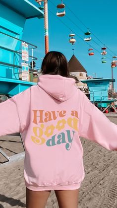 This stylish and comfy sweatshirt is perfect for any day when you want to stay cozy and show off your positive attitude. It features a relaxed fit with a bold graphic on the back that reads 'Have a Good Day' in cheerful colors. The soft, lightweight fabric and long sleeves make it the perfect pick for layering over your favorite tees. It's sure to bring a smile to everyone you meet! Gildan 18500 50% cotton, 50% polyester Medium-heavy fabric  Classic fit Tear-away label Runs true to size Let me know if you have any questions! Xo, Bobbi Cute Hoodie Sweatshirt With Letter Print, Cute Oversized Hoodie With Letter Print, Trendy Letter Print Sweats For Leisure, Cute Oversized Hoodie For Loungewear, Cute Letter Print Hoodie For Loungewear, Relaxed Fit Hoodie With Letter Print For Leisure, Trendy Letter Print Hoodie For Leisure, Cotton Sweatshirt With Letter Print For Weekend, Comfortable Long Sleeve Hoodie With Letter Print