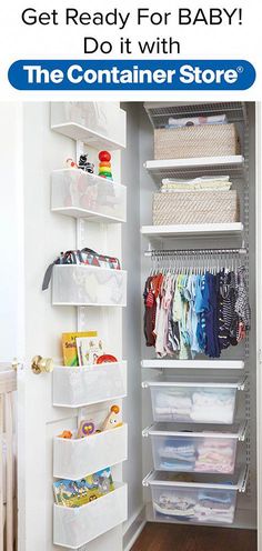 an organized closet with white shelves and bins for baby's clothing, diapers and toys