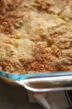 a casserole dish filled with food sitting on top of a table