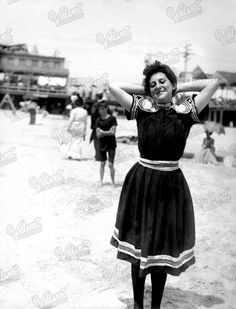 "WOMAN in VINTAGE SWIMWEAR 1900s Vintage Printable, Summer Holiday, Swimsuit Fashion Ephemera, Antique Photograph Digital Download 300dpi Jpg This is a genuine antique photograph dating from the 1900s, which measures 3.5\" x 4.5\". The picture features a lovely young woman, posing happily on a beach in her stylish and perfectly period 1900s swimwear.  This vintage photo is a fantastic piece of social history ephemera, making it perfect for including with other items in summer vacation, seaside or even vintage fashion themed junk journal tuck spots and pockets. It could also be used in collage, card making, mixed media projects, scrapbooking and more.  ▶ ITEM DETAILS:  -The file is a high quality 300dpi image in JPG format. It measures 3.5\" x 4.5\" or 1050 x 1376 pixels.  The file you will Vintage French Swimwear, Vintage Swimwear Beach, Framed Vintage Swimwear, Vintage Swimwear Goth, Summer Swimwear Vintage, Female Swimmers, Bathing Costumes, Vintage Swimwear, Photo Vintage