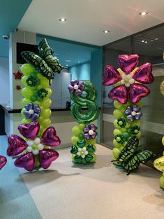 balloons are arranged in the shape of numbers and flowers