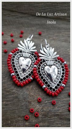 Inola - Red Beaded Silver Sacred Heart Earrings Dangle Latina Lace Love Latinx Fiesta Flaming Hearts Interesting Jewelry Designs, Bohemian Beaded Jewelry For Valentine's Day, Handmade Heart-shaped Earrings For Festive Occasions, Handmade Heart-shaped Festive Earrings, Valentine's Day Bohemian Beaded Jewelry, Heart Shaped Beaded Jewelry For Festive Occasion, Nickel Free Heart Earrings For Festivals, Bohemian Heart Beads Jewelry For Valentine's Day, Nickel Free Heart Shaped Jewelry For Festivals