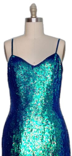 Iridescent Sequin Dress For Party Season, Fitted Embellished Mermaid Evening Dress, Glamorous Blue Sequin Mermaid Dress, Iridescent Sequin Dress For Night Out, Fitted Mermaid Sequin Dress For Prom, Fitted Mermaid Sequin Dress For Prom Season, Blue Sequined Mermaid Dress, Blue Embellished Mermaid Dress, Iridescent Sequin Dresses For Party Season