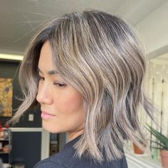 Brown Gray Hair with Blonde Highlights Grey Hair With Low Lights Over 50, Gray Bronde Balayage, Low Lights With Gray Hair, Letting Grey Hair Grow Out Highlights, Ash Blonde Grey Blending, Salt And Pepper Hair With Blonde Highlights, Best Way To Hide Gray Hair, Blonde Highlights On Salt And Pepper Hair, Transitioning Grey Hair