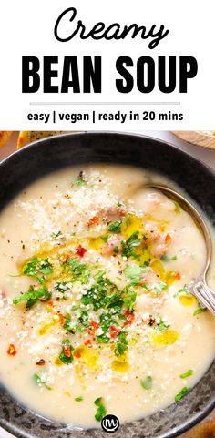 creamy bean soup in a black bowl