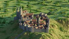 an aerial view of a castle in the middle of a field