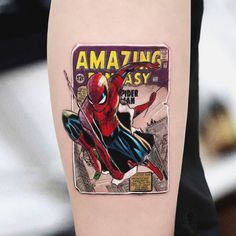 a spider - man tattoo on the arm