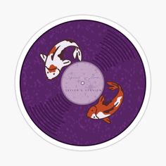 two koi fish swimming on top of a purple record sticker with the words love and