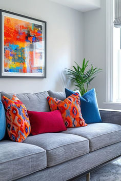 a living room filled with lots of furniture and colorful pillows on top of the couch