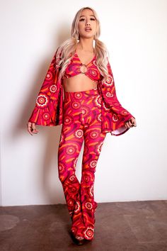 Say hello to your new favorite pants! Our Highwaist Bell Bottoms in Red Flowers are sure to be your go-to for those '70s-style grooves and disco nights! With their throwback style and fun pattern, you'll be turning heads in this retro pair of pants. Shake your groovy thing! This listing is for the pants ONLY. They are pictured with our matching Disco Ring Top. The pants are HIGH-WAISTED. The rise is approx 12". The inseam is 34.75", they are cut a little longer to wear with heels. They are made Flare Pants 70s, Velvet Flare Pants, Disco Night, 70s Look, Velvet Set, 70s Outfits, Velvet Flares, 70s Style, Bell Bottom Pants