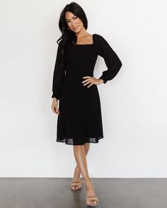 From the square neck to the wrist-hugging sleeves, the Elise Short Dress | Black effortlessly blends sophistication and comfort 🖤✨ Hurry, it's a wardrobe favorite for a reason! Shop this beauty! 🛍️ Black Dresses With Elastic Sleeves For Fall, Fall Evening Dresses With Smocked Back, Chic Smocked Dress With Square Neck, Elegant Knee-length Midi Dress With Smocked Bodice, Elegant Flowy Smocked Midi Dress, Black Midi Dress With Elastic Sleeves For Fall, Elegant Formal Midi Dress With Smocked Bodice, Elegant Flowy Smocked Dress With Ruched Details, Elegant Flowy Ruched Smocked Dress