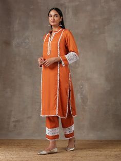 Rust Orange Lace Detail Cotton Kurta Set (Set of 2) By Label Nitika now available at Trendroots Cotton Kurta Set, Orange Outfit, Crochet Fabric, Cotton Kurta, Tailored Design, Orange Fabric, Rust Orange, Kurta Set, Girls Fashion Clothes