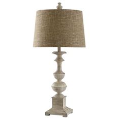 A classic candlestick styled body is styled with an Ivory, Cream, Tan finish in this table lamp. Perfect for dressing up any table top, nightstand, or side table, this versatile table lamp blends in with traditional dcor. Update the living room or bedroom with this beautifully designed addition. Size: 31.  Color: Multicolor. Cream Table Lamps, Distressed Table, White Candle Sticks, Country Table, Incandescent Light Bulb, A&b Home, White Table Lamp, Light Bulb Types, White Table