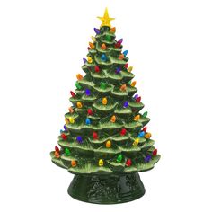 a green ceramic christmas tree with multi colored lights