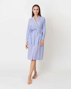 We take fabric seriously, especially when it comes to the kinds of basics you wear every single day. Or night! This is a classic, menswear-style robe that's plenty feminine (but substantial enough in case you need to answer the door or something) and made up in the same soft, striped Japanese cotton lawn that we use for our shirting. The construction details are the same, too — 22 stitches/inch, flat-felled seams — so they're a worthy investment. There are side pockets, which are perfect for your phone, melatonin gummies, spare change, or anything else you like to keep handy around bedtime. We also make a matching nightgown, so you can go for the full look. Clothing Catalog, Buckle Shoes, Japanese Cotton, Sweater Gift, Sleepwear & Loungewear, Every Single Day, The Door, Outerwear Jackets, Night Gown