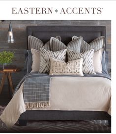 an advertisement for eastern accents featuring pillows and blankets