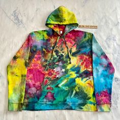 Tie Dye Hoodie Rainbow Ice Dye Hooded Sweatshirt Pullover Hoody Hand Dyed Men's Unisex Women's  XL, 2X or 3X Ready to Ship! You will love wearing this unique, one of a kind, hand dyed piece of art! Awesome gift idea. Hippie, Boho/Bohemian Style, Festival Fashion. Comfortable, breathable, natural fiber fabric. Perfect for everyday wear or special occasions. I use only the highest quality fiber reactive dye. Your Tie Dye clothing won't fade and will stay vibrant for many years to come!  All items are hand tied and dyed by me. Each individual Tie Dye has it's own unique characteristics, like a snowflake. Tie dyes will arrive washed and ready to wear. Wash alone for first time only. Machine wash cold or warm water. Machine or air dry. If you have any questions please send me a message. I would Winter Tie Dye Cotton Hoodie, Fall Multicolor Hand-dyed Hoodie, Winter Tie-dye Long Sleeve Hoodie, Rainbow Tie Dye Hoodie, Oversized Tie-dye Hoodie, Style Festival, Fashion Comfortable, Dye Hoodie, Boho Fashion Bohemian