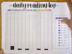 someone is holding up a daily reading log