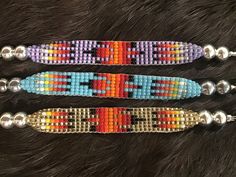 "Beautiful handmade Navajo Hand Beaded Cuffs Bracelets Handcrafted by Navajo Artist R. Sellers🌷 Length 4.5\" Present in virtually every Native American tribe, the feather symbol is universally recognized as a representation of trust, strength, wisdom, freedom, and honor. Incorporated into many sacred pieces of Native American wear, the feather is easily one of the most respected symbols." Southwestern Style Multicolor Handwoven Beaded Bracelets, Adjustable Southwestern Bracelet With Tiny Beads, Southwestern Multicolor Friendship Bracelets With Round Beads, Southwestern Multicolor Round Beads Friendship Bracelets, Southwestern Style Multicolor Round Beads Friendship Bracelets, Southwestern Festival Cuff Bracelet With Round Beads, Adjustable Southwestern Friendship Bracelets, Southwestern Style Handwoven Bracelets, Handwoven Southwestern Style Bracelets For Festivals