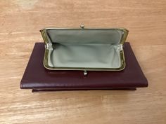 "Princess Gardner burgundy leather trifold wallet with snap coin purse. Multiple card holders . Will hold a passport and slim cellphone. Never used. Width 7\" Depth 4\" closed 2 cash holders  5 leather card holders including one clear for ID 11 plastic card holders  Check holder 5\" wide snap close coin  purse on back of wallet" Snap Coin Purse, Cash Wallet, Leather Trifold Wallet, Plastic Card, Money Clip Wallet, Trifold Wallet, Card Holder Leather, Card Holders, Purse Wallet